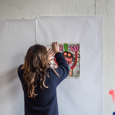 Jessica pinning a monster in Bortusk's studio