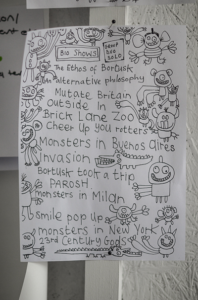 Bortusk's website's outline pinned on wall