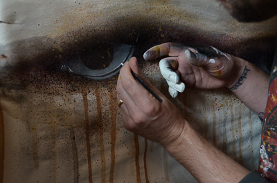 My Dog Sighs working in his studio - close-up on eye