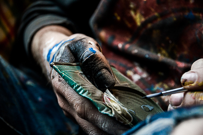My Dog Sighs working on a tin man