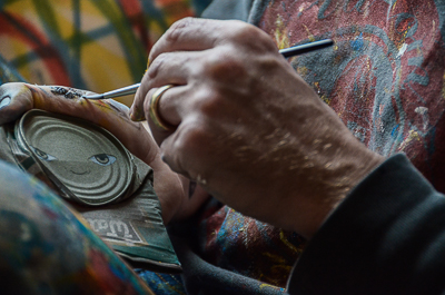 My Dog Sighs working on a tin man