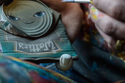 My Dog Sighs working on a tin man
