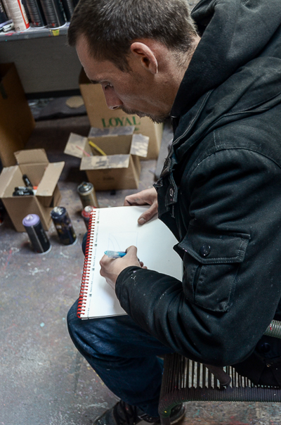 Astro sketching in his studio