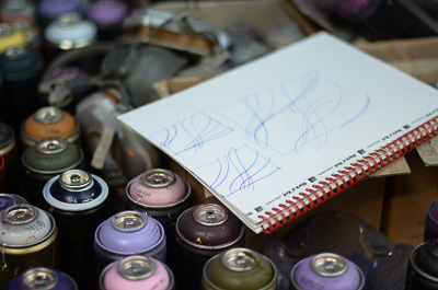 Astro's sketchbook and cans