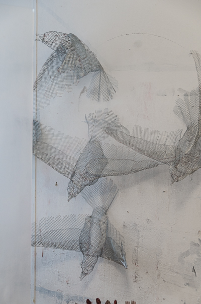 Inside Borondo's studio - wall of metallic crows - Work in progress