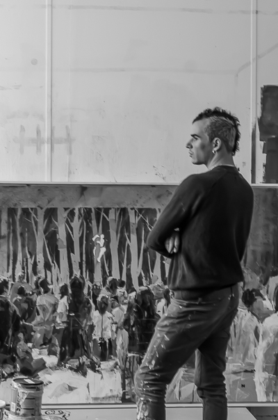 Borondo in front of his canvas