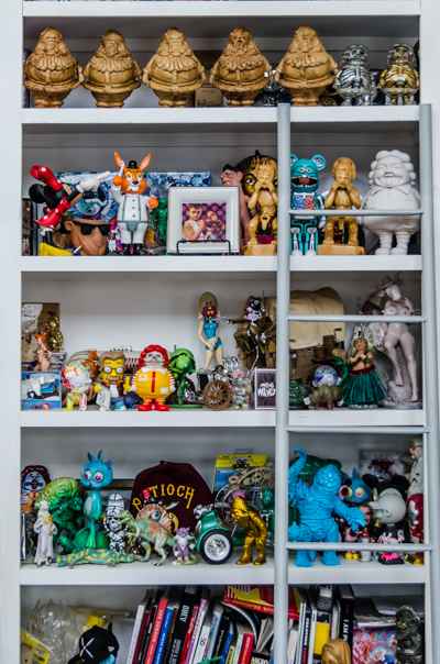 Inside Ron English's living room - shelves