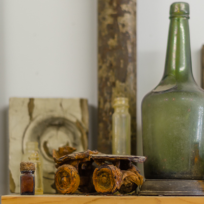 Inside Beau Stanton's studio - Rusty child's roller skate and bottles found on the shore of Dead Horse Bay in Brooklyn