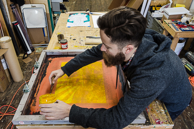 First step of screen printing Leviathan - coating the screen with yellow ink