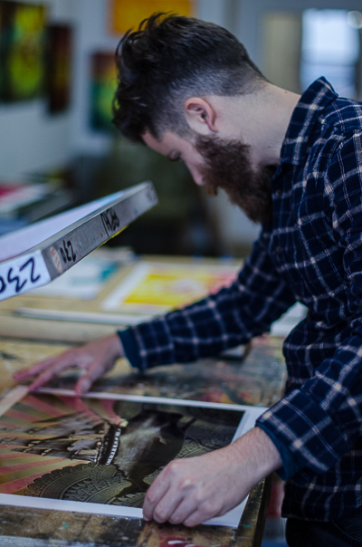 Beau Stanton adjusting his print for the final layering