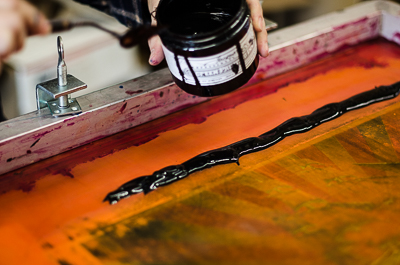 Beau Stanton adding a black layer of ink for his Leviathan screen prints