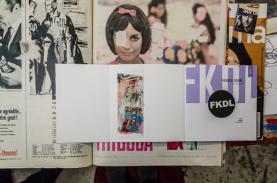 FKDL likes to autograph his books with a little art scotch piece