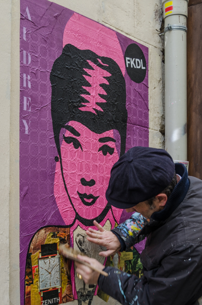 FKDL taking out the air bubbles which may have formed underneath his piece