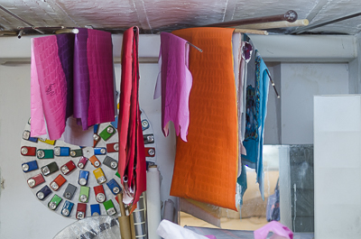 Inside FKDL's studio - table cloths hanging, which will be used for paste-ups