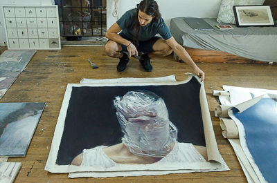 Axel Void showing a canvas from the Sehnsucht series