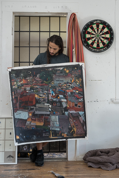 Axel Void showing an oil on canvas piece